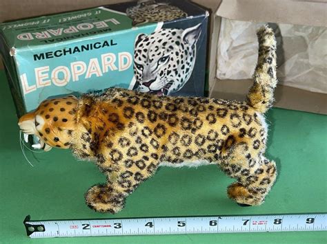 wind up metal leopard toy with fabric wheels in feet|MARX Mechanical Leopard Louis Marx & Co. ORIGINAL BOX.